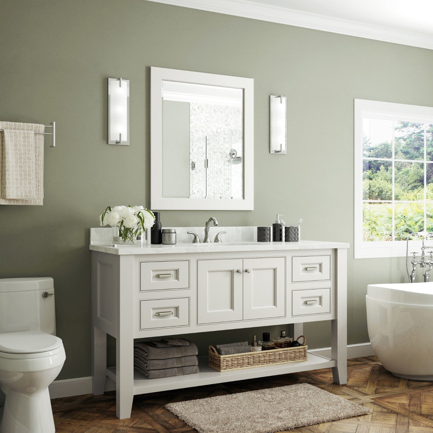 Bathroom with white vanity, mirror, and toilet against a green wall.